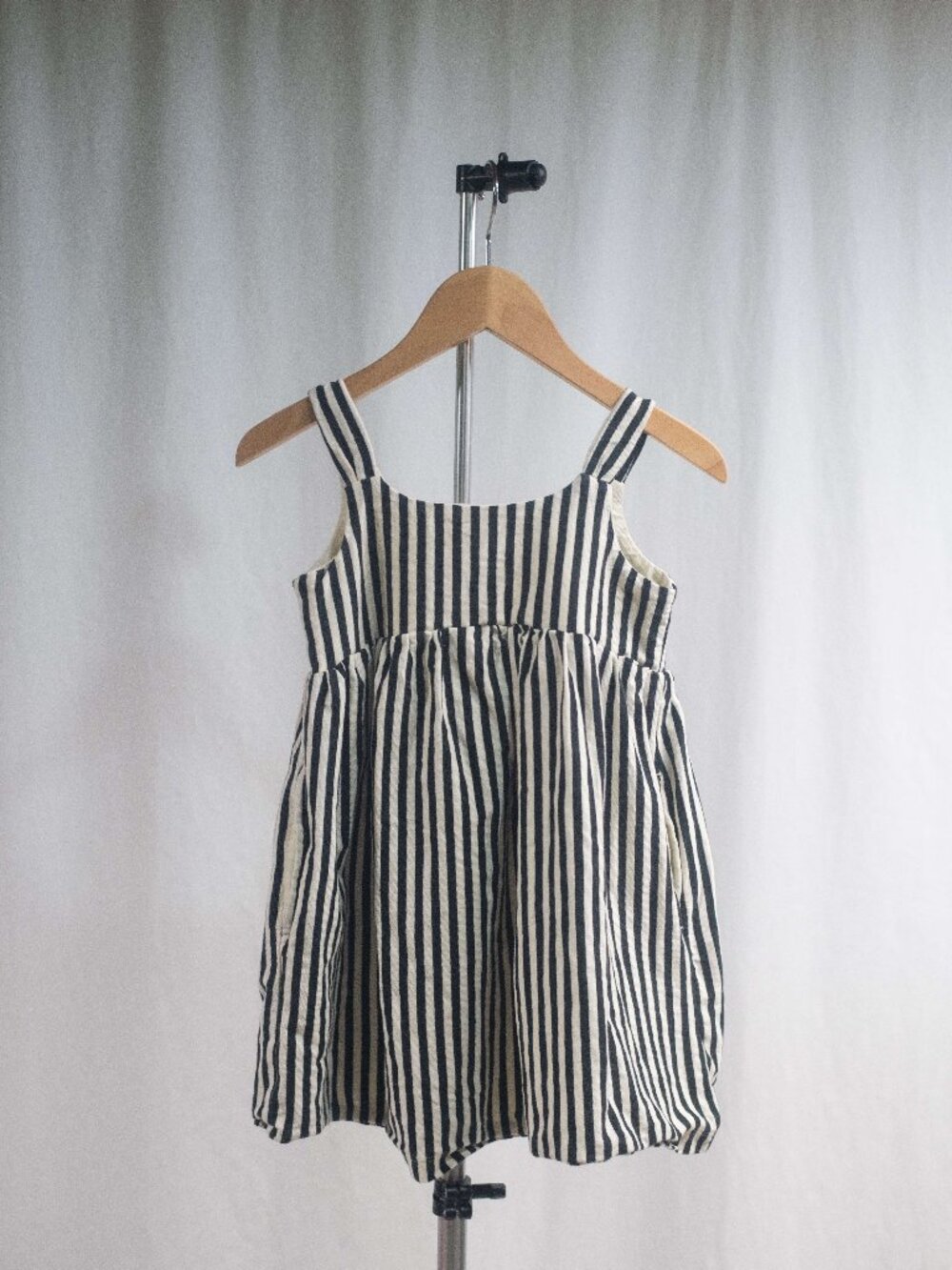 Hanna Andersson Sleeveless Swing Dress with Pockets in Black